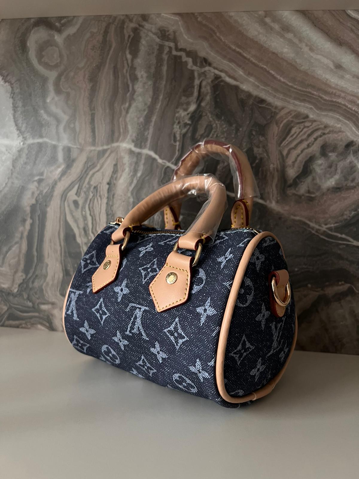 LV KOT DESENLİ ÇANTA