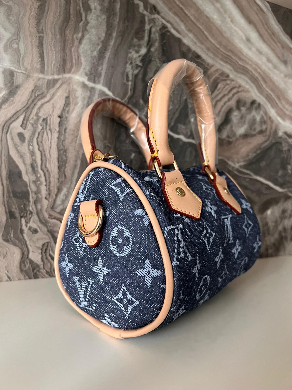 LV KOT DESENLİ ÇANTA